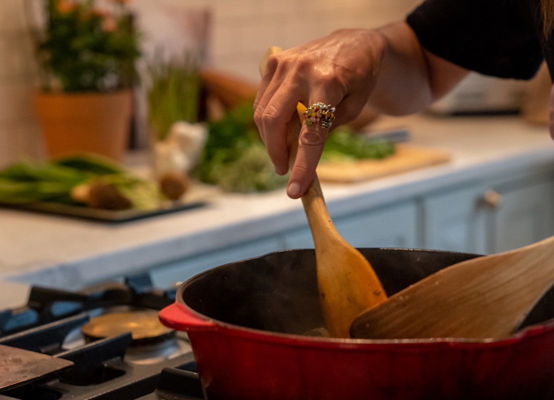 Vegetable soup simmering in pot